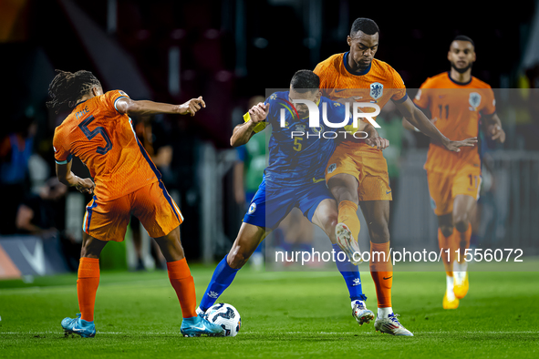 Netherlands midfielder Ryan Gravenberch and Bosnia and Herzegovina defender Adrian Leon Barisic during the match between the Netherlands and...