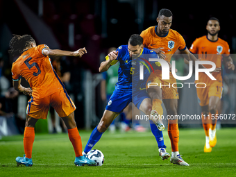 Netherlands midfielder Ryan Gravenberch and Bosnia and Herzegovina defender Adrian Leon Barisic during the match between the Netherlands and...