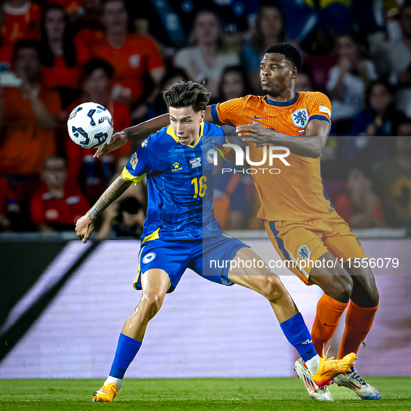 Bosnia and Herzegovina midfielder Denis Huseinbasic and Netherlands defender Denzel Dumfries during the match between the Netherlands and Bo...