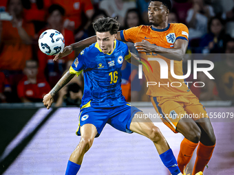 Bosnia and Herzegovina midfielder Denis Huseinbasic and Netherlands defender Denzel Dumfries during the match between the Netherlands and Bo...