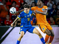 Bosnia and Herzegovina midfielder Denis Huseinbasic and Netherlands defender Denzel Dumfries during the match between the Netherlands and Bo...