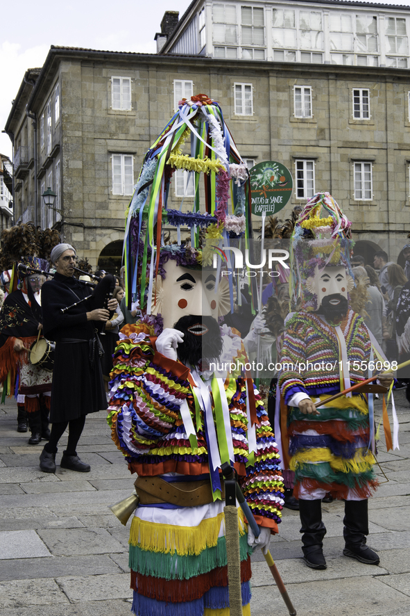 The annual parade of traditional costumes for the entroido, as the carnival is known in Galicia, takes place through the streets of Santiago...