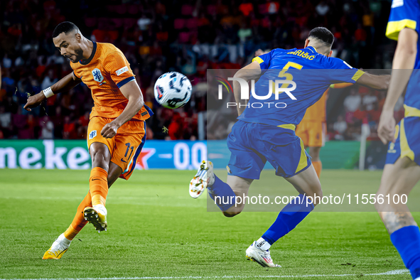 Netherlands forward Cody Gakpo and Bosnia and Herzegovina defender Adrian Leon Barisic during the match between the Netherlands and Bosnia a...