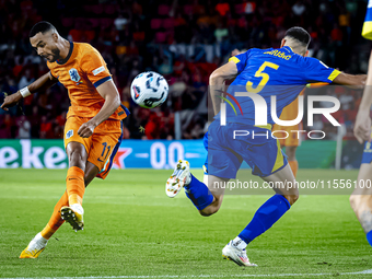 Netherlands forward Cody Gakpo and Bosnia and Herzegovina defender Adrian Leon Barisic during the match between the Netherlands and Bosnia a...