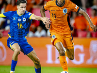 Bosnia and Herzegovina midfielder Denis Huseinbasic and Netherlands forward Cody Gakpo during the match between the Netherlands and Bosnia a...