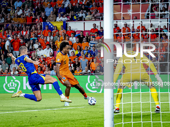 Bosnia and Herzegovina defender Nikola Katic and Netherlands forward Joshua Zirkzee during the match between the Netherlands and Bosnia and...