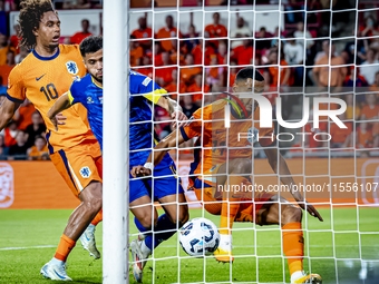 Netherlands forward Cody Gakpo scores the 2-2 during the match between the Netherlands and Bosnia and Herzegovina at the Philips Stadium for...