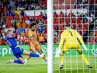 Bosnia and Herzegovina defender Nikola Katic and Netherlands forward Joshua Zirkzee during the match between the Netherlands and Bosnia and...