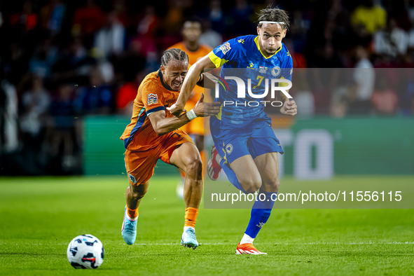 Netherlands midfielder Xavi Simons and Bosnia and Herzegovina defender Amar Dedic during the match between the Netherlands and Bosnia and He...