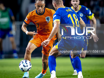 Netherlands midfielder Xavi Simons plays during the match between the Netherlands and Bosnia and Herzegovina at the Philips Stadium for the...