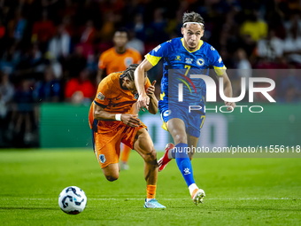 Netherlands midfielder Xavi Simons and Bosnia and Herzegovina defender Amar Dedic during the match between the Netherlands and Bosnia and He...