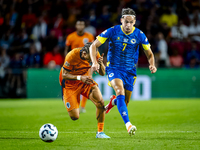 Netherlands midfielder Xavi Simons and Bosnia and Herzegovina defender Amar Dedic during the match between the Netherlands and Bosnia and He...