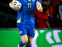 Bosnia and Herzegovina forward Edin Dzeko scores the 3-2 and celebrates the goal during the match between the Netherlands and Bosnia and Her...