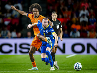 Netherlands forward Joshua Zirkzee and Bosnia and Herzegovina defender Nihad Mujakic during the match between the Netherlands and Bosnia and...