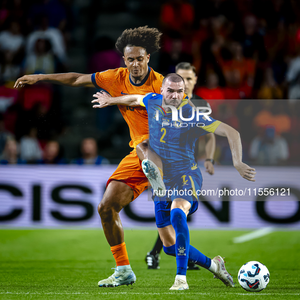 Netherlands forward Joshua Zirkzee and Bosnia and Herzegovina defender Nihad Mujakic during the match between the Netherlands and Bosnia and...