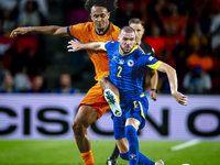 Netherlands forward Joshua Zirkzee and Bosnia and Herzegovina defender Nihad Mujakic during the match between the Netherlands and Bosnia and...