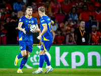 Bosnia and Herzegovina forward Edin Dzeko scores the 3-2 and celebrates the goal during the match between the Netherlands and Bosnia and Her...