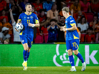 Bosnia and Herzegovina forward Edin Dzeko scores the 3-2 and celebrates the goal during the match between the Netherlands and Bosnia and Her...