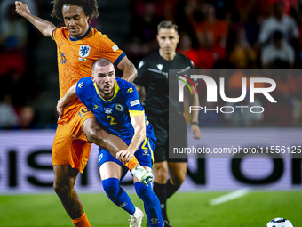 Netherlands forward Joshua Zirkzee and Bosnia and Herzegovina defender Nihad Mujakic during the match between the Netherlands and Bosnia and...