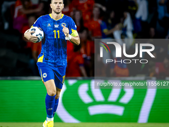 Bosnia and Herzegovina forward Edin Dzeko scores the 3-2 and celebrates the goal during the match between the Netherlands and Bosnia and Her...