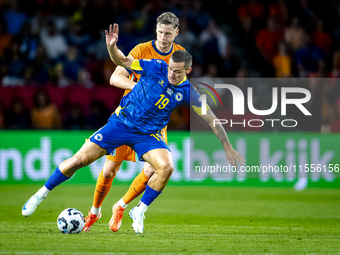 Bosnia and Herzegovina forward Ermedin Demirovic and Netherlands forward Wout Weghorst during the match between the Netherlands and Bosnia a...