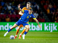 Bosnia and Herzegovina forward Ermedin Demirovic and Netherlands forward Wout Weghorst during the match between the Netherlands and Bosnia a...