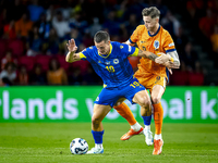 Bosnia and Herzegovina forward Ermedin Demirovic and Netherlands forward Wout Weghorst during the match between the Netherlands and Bosnia a...