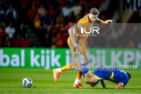 Bosnia and Herzegovina forward Ermedin Demirovic and Netherlands forward Wout Weghorst during the match between the Netherlands and Bosnia a...