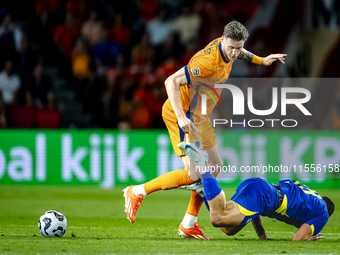 Bosnia and Herzegovina forward Ermedin Demirovic and Netherlands forward Wout Weghorst during the match between the Netherlands and Bosnia a...