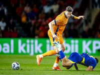 Bosnia and Herzegovina forward Ermedin Demirovic and Netherlands forward Wout Weghorst during the match between the Netherlands and Bosnia a...