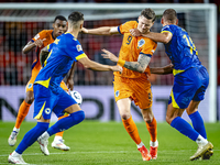 Netherlands forward Wout Weghorst and Bosnia and Herzegovina defender Nikola Katic during the match between the Netherlands and Bosnia and H...