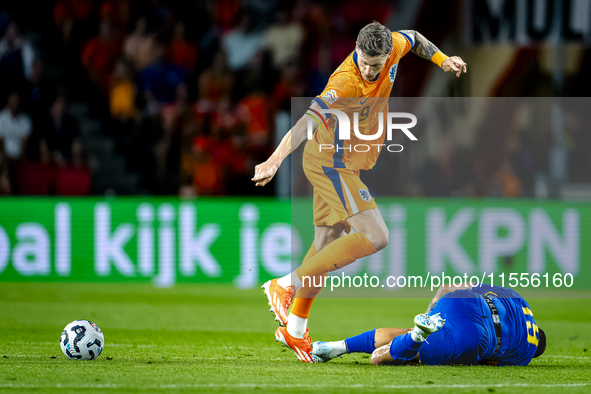 Bosnia and Herzegovina forward Ermedin Demirovic and Netherlands forward Wout Weghorst during the match between the Netherlands and Bosnia a...