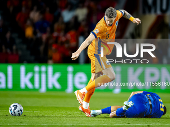 Bosnia and Herzegovina forward Ermedin Demirovic and Netherlands forward Wout Weghorst during the match between the Netherlands and Bosnia a...