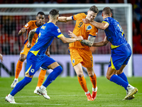 Netherlands forward Wout Weghorst and Bosnia and Herzegovina defender Nikola Katic during the match between the Netherlands and Bosnia and H...