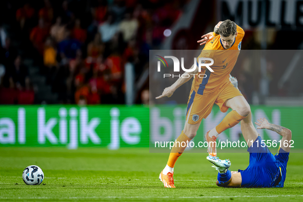 Bosnia and Herzegovina forward Ermedin Demirovic and Netherlands forward Wout Weghorst during the match between the Netherlands and Bosnia a...