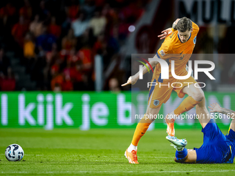 Bosnia and Herzegovina forward Ermedin Demirovic and Netherlands forward Wout Weghorst during the match between the Netherlands and Bosnia a...