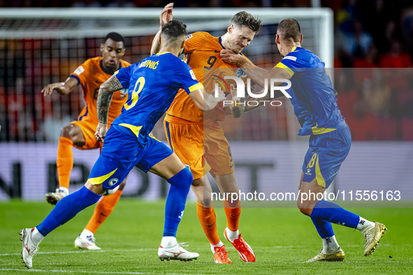 Netherlands forward Wout Weghorst and Bosnia and Herzegovina defender Nikola Katic during the match between the Netherlands and Bosnia and H...