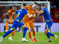 Netherlands forward Wout Weghorst and Bosnia and Herzegovina defender Nikola Katic during the match between the Netherlands and Bosnia and H...