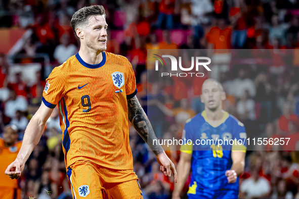 Netherlands forward Wout Weghorst scores the 4-2 during the match between the Netherlands and Bosnia and Herzegovina at the Philips Stadium...