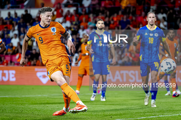 Netherlands forward Wout Weghorst scores the 4-2 during the match between the Netherlands and Bosnia and Herzegovina at the Philips Stadium...