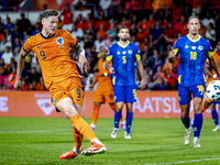 Netherlands forward Wout Weghorst scores the 4-2 during the match between the Netherlands and Bosnia and Herzegovina at the Philips Stadium...