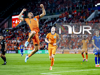 Netherlands midfielder Xavi Simons scores the 5-2 during the match between the Netherlands and Bosnia and Herzegovina at the Philips Stadium...