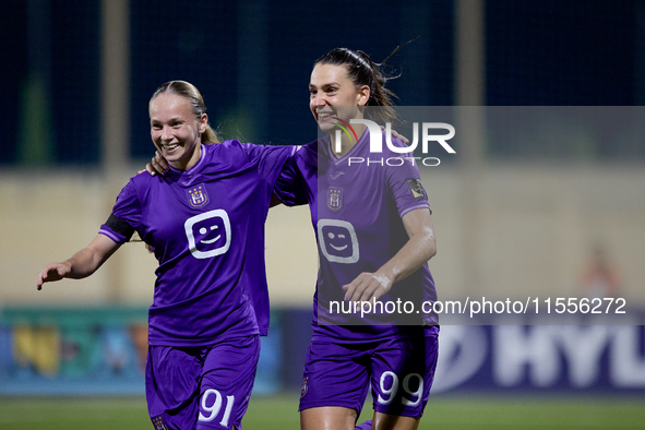 Amelie Delabre (R) of Anderlecht celebrates scoring the 1-0 goal with teammate Fanny Rossi (L) during the UEFA Women's Champions League Firs...