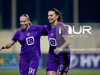 Amelie Delabre (R) of Anderlecht celebrates scoring the 1-0 goal with teammate Fanny Rossi (L) during the UEFA Women's Champions League Firs...