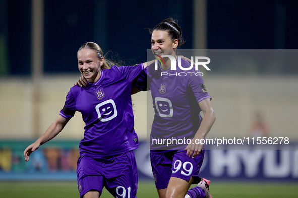 Amelie Delabre (R) of Anderlecht celebrates scoring the 1-0 goal with teammate Fanny Rossi (L) during the UEFA Women's Champions League Firs...