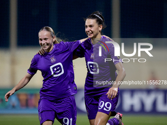 Amelie Delabre (R) of Anderlecht celebrates scoring the 1-0 goal with teammate Fanny Rossi (L) during the UEFA Women's Champions League Firs...