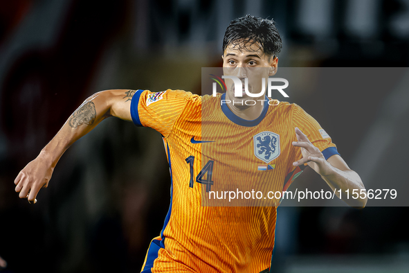 Netherlands midfielder Tijani Reijnders plays during the match between the Netherlands and Bosnia and Herzegovina at the Philips Stadium for...