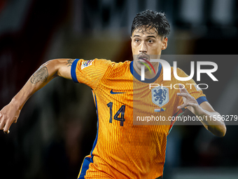 Netherlands midfielder Tijani Reijnders plays during the match between the Netherlands and Bosnia and Herzegovina at the Philips Stadium for...