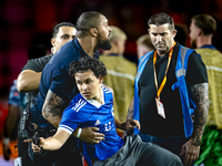 A supporter of Bosnia and Herzegovina stands on the pitch during the match between the Netherlands and Bosnia and Herzegovina at the Philips...