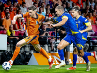 Netherlands forward Wout Weghorst and Bosnia and Herzegovina defender Nikola Katic during the match between the Netherlands and Bosnia and H...